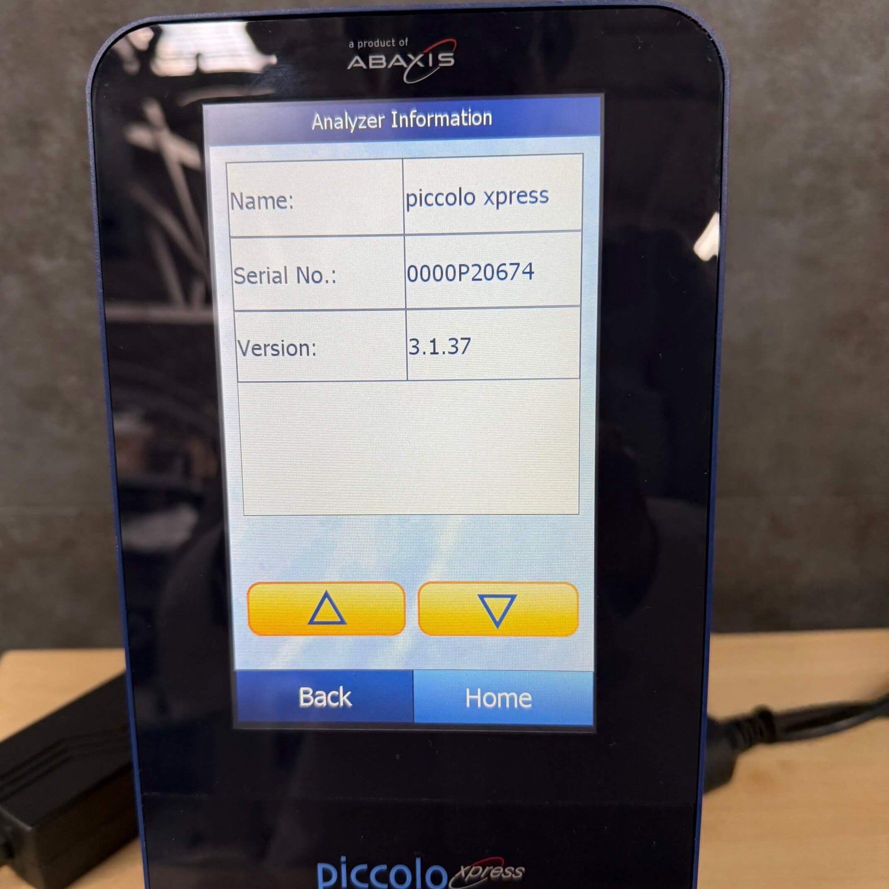 ABAXIS piccolo xpress analyzer with display showing information