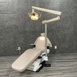 Used Belmont Exam Chair with ADEC light for sale near me
