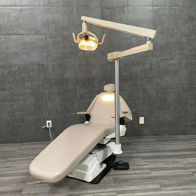 Used Belmont Exam Chair with ADEC light for sale near me