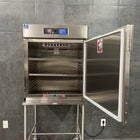 Interior view of Blickman 7922MS medical blanket warmer showing adjustable stainless steel shelves - Buy near me