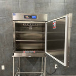 Interior view of Blickman 7922MS medical blanket warmer showing adjustable stainless steel shelves - Buy near me