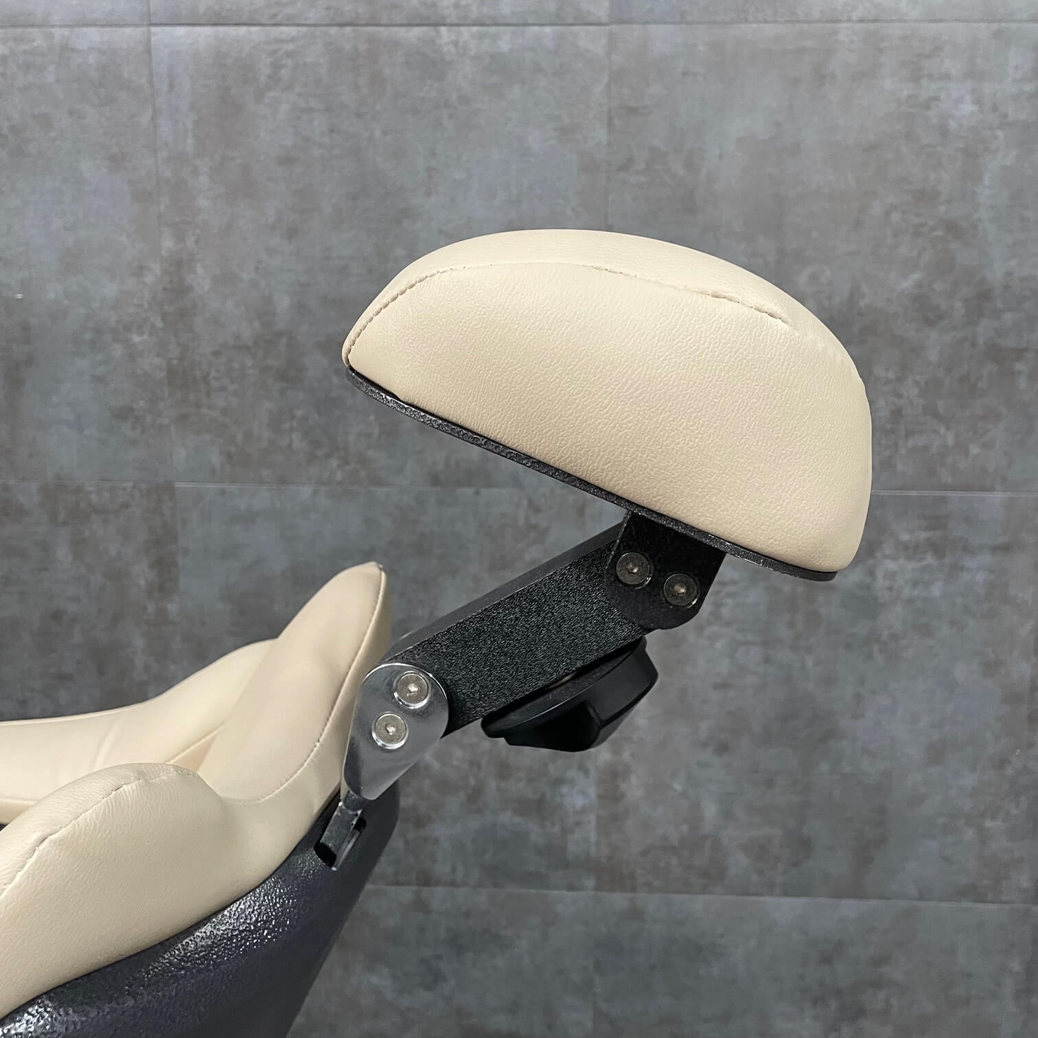 Outpatient surgery chair shown with tilted headrest