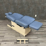 Hill Adjustable Power Procedure Chair in flat position near me