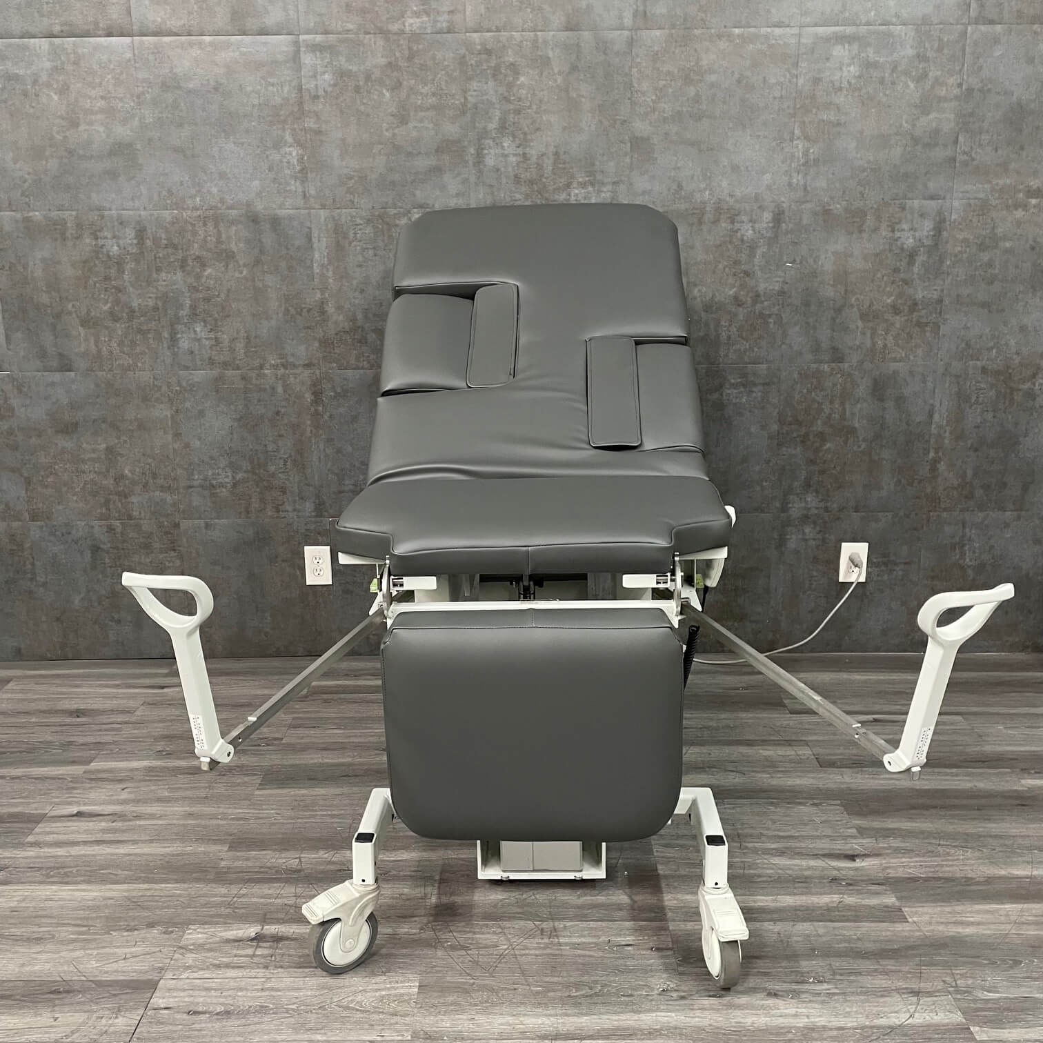 MPI Ultrascan Versa Table with adjustable stirrups extended for OB/GYN exam