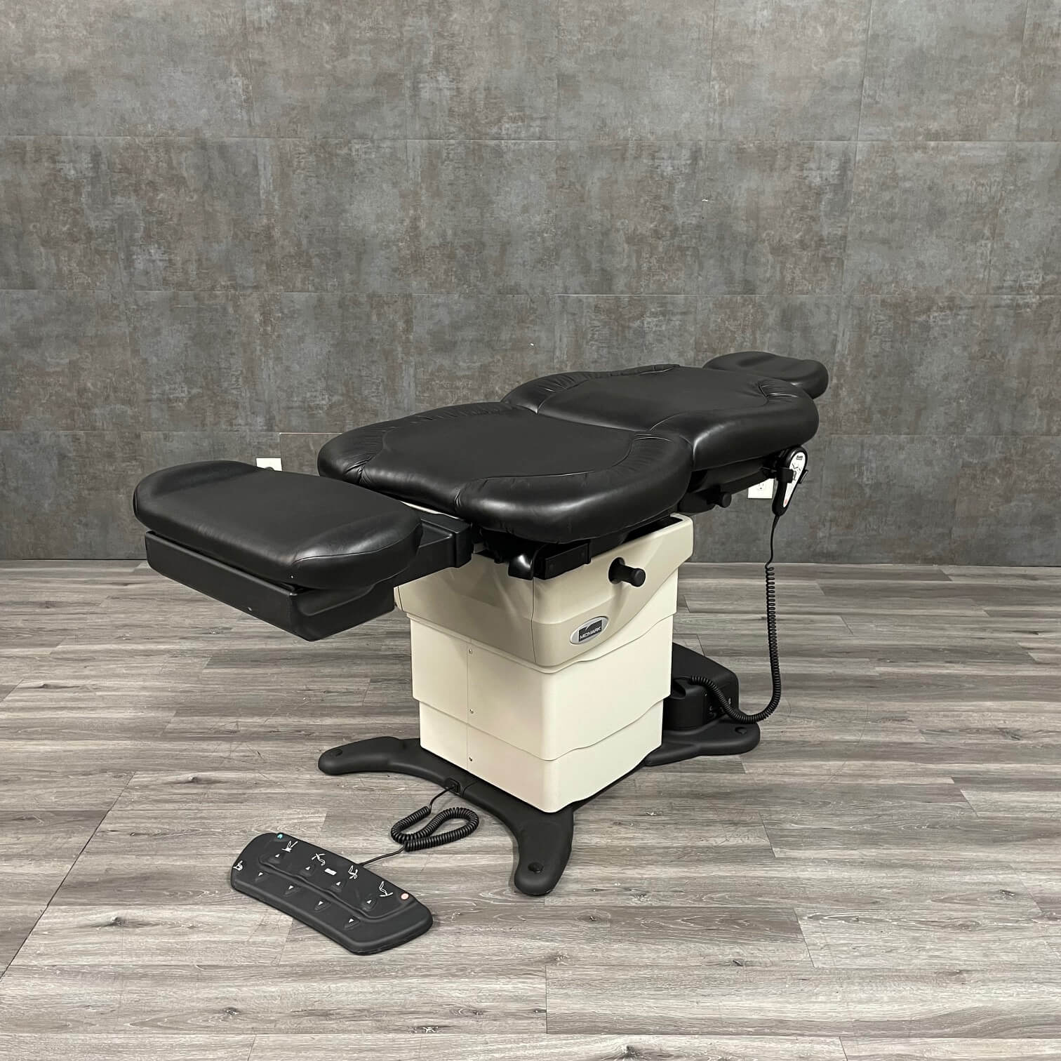 ADA-compliant Midmark 630 chair laid flat and can be used as a procedure table 