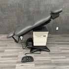 Ritter Exam Table with tilt and rotation with laying flat and full tilt shown in Los Angeles near me