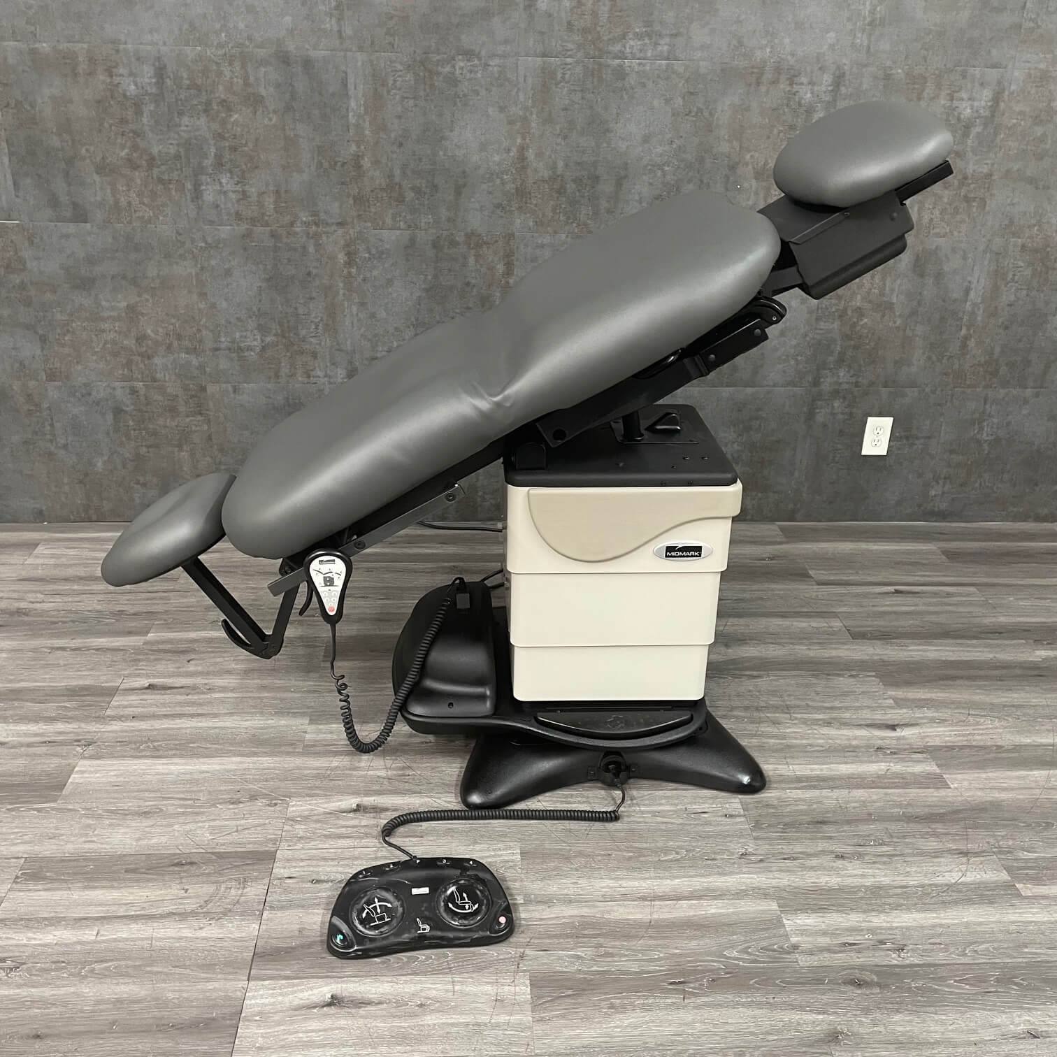 Ritter Exam Table with tilt and rotation with laying flat and full tilt shown in Los Angeles near me