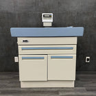 Midmark Ritter 640 pediatric examination table with integrated infant scale and storage cabinet