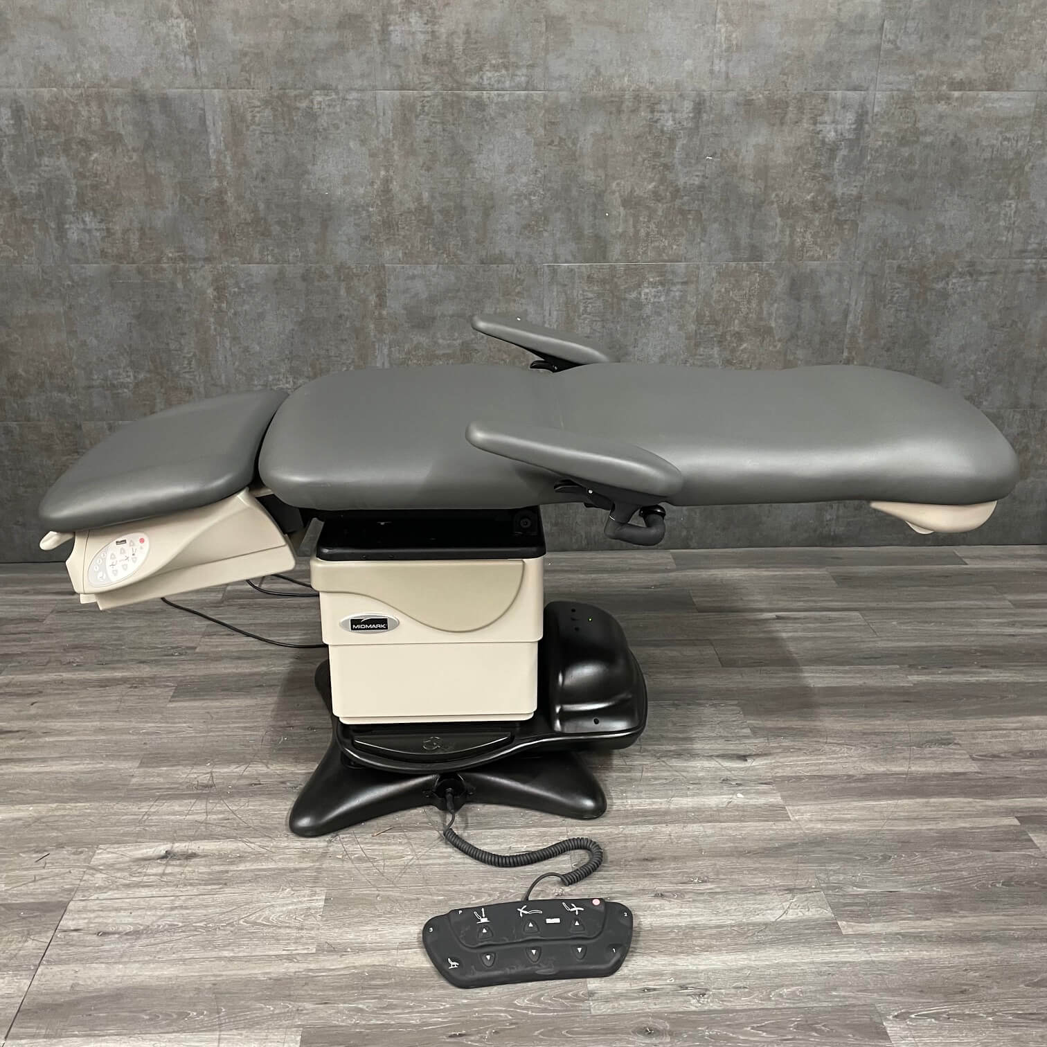 Podiatry chair shown in flat position - Price