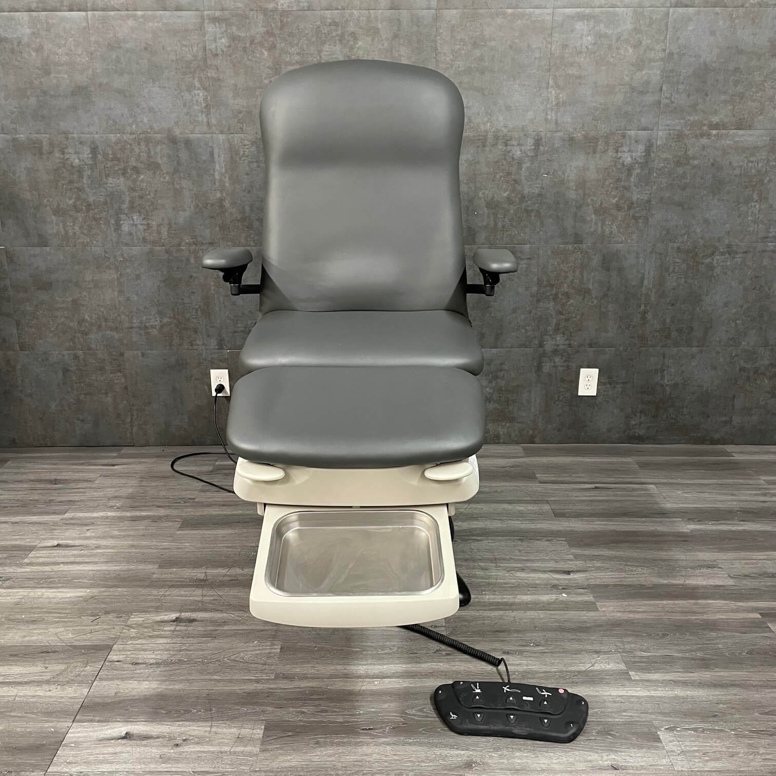 Midmark Podiatry chair shown with the tray pulled out - near me