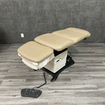 Midmark Ritter 647 Podiatry Chair - Angelus Medical - with the back shown all the way to a flat position