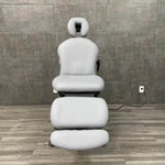 Buy Refurbished Ritter 641 procedure chair showing powered backrest and footrest near me