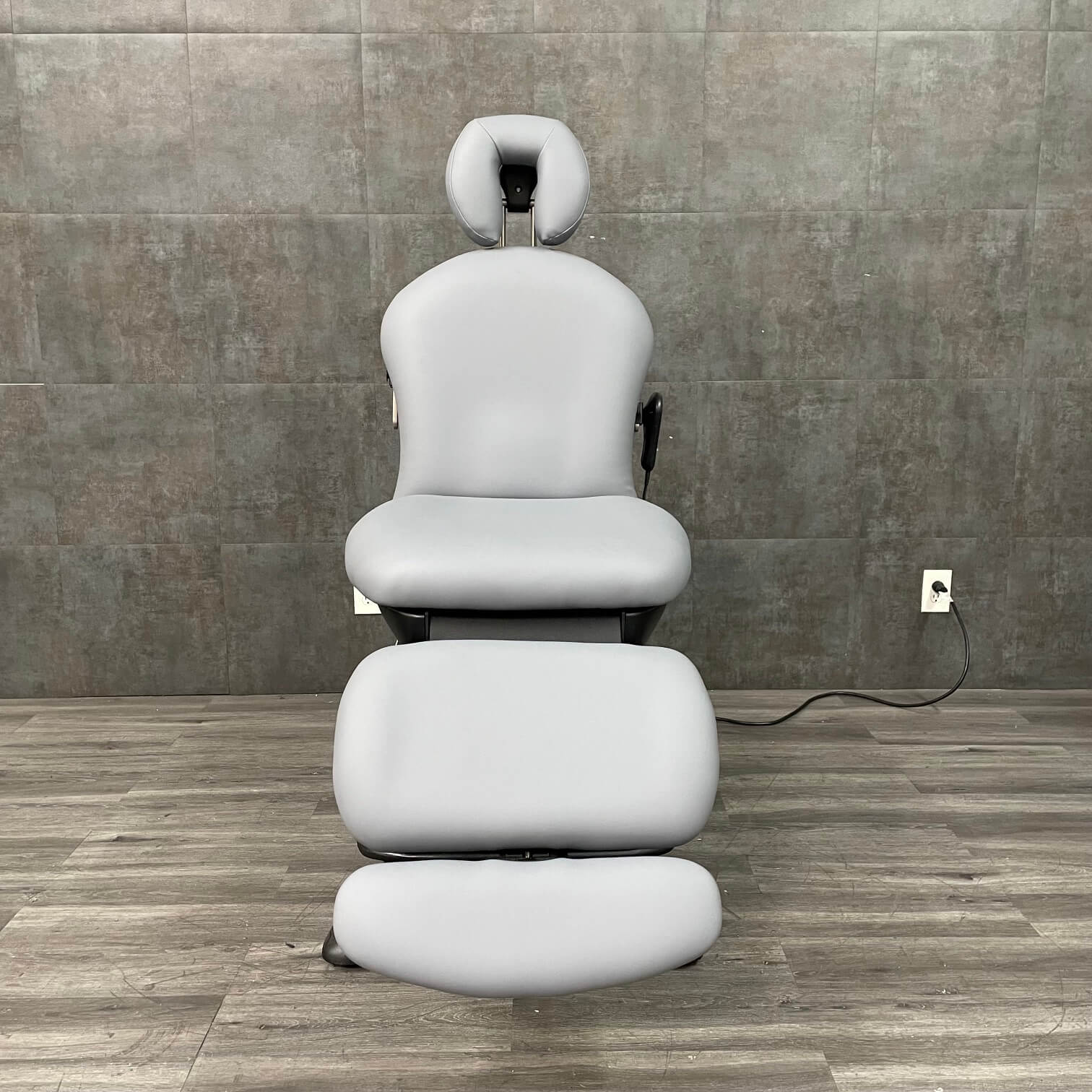 Buy Refurbished Ritter 641 procedure chair showing powered backrest and footrest near me