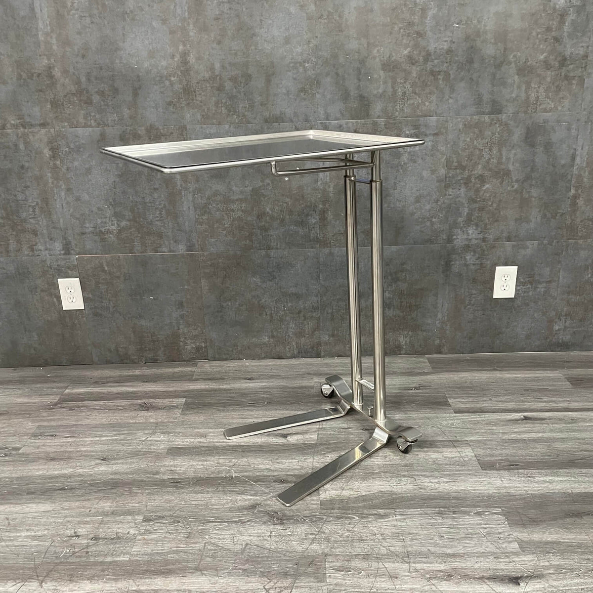 Used foot operated mayo stand view of the side - Large tray 20 x 25