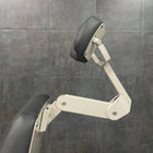 Adjustable headrest on Reliance 7100 examination chair for patient comfort