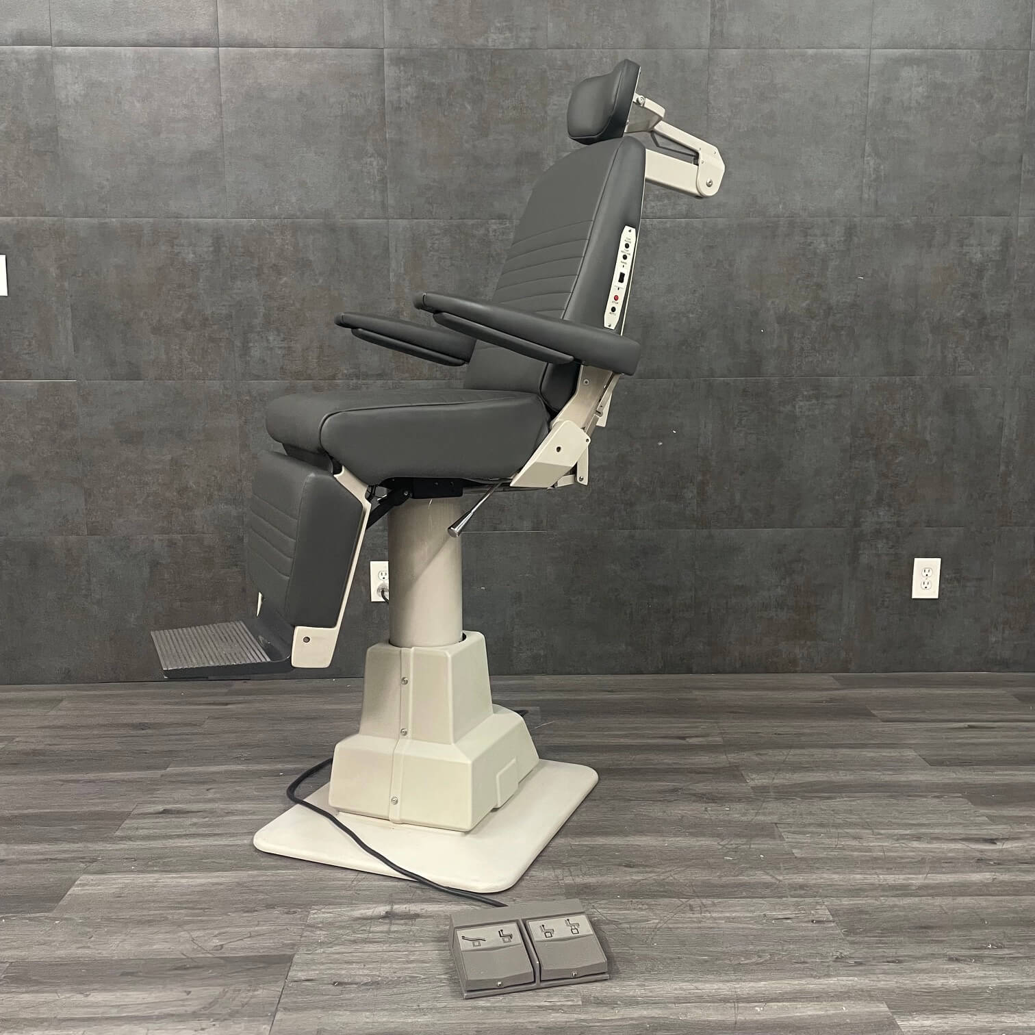 Side view of Reliance 7100 powered examination chair with hydraulic base - For sale near me