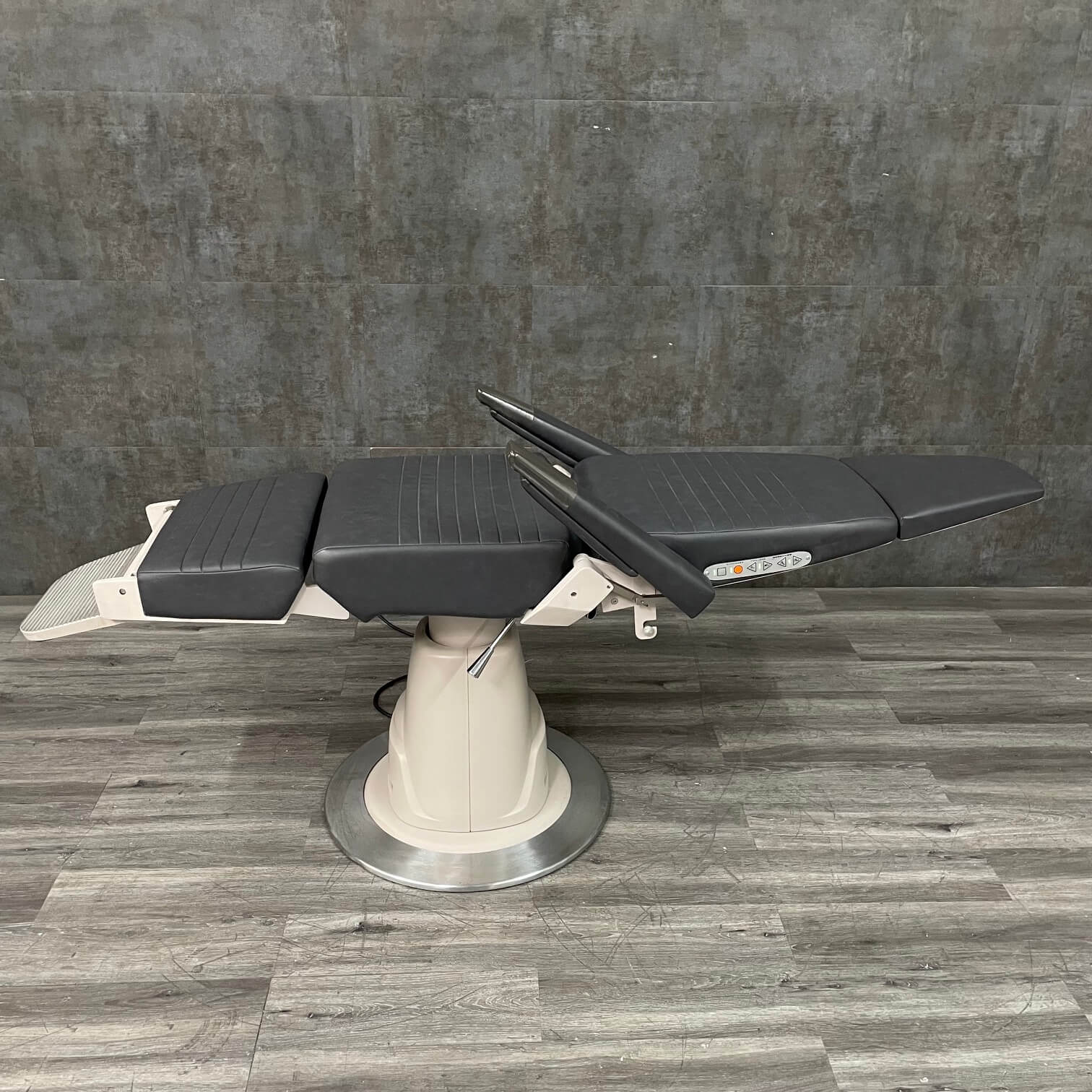 Used Reliance 710 exam chair fully reclined with arms up - procedure chair for sale near me