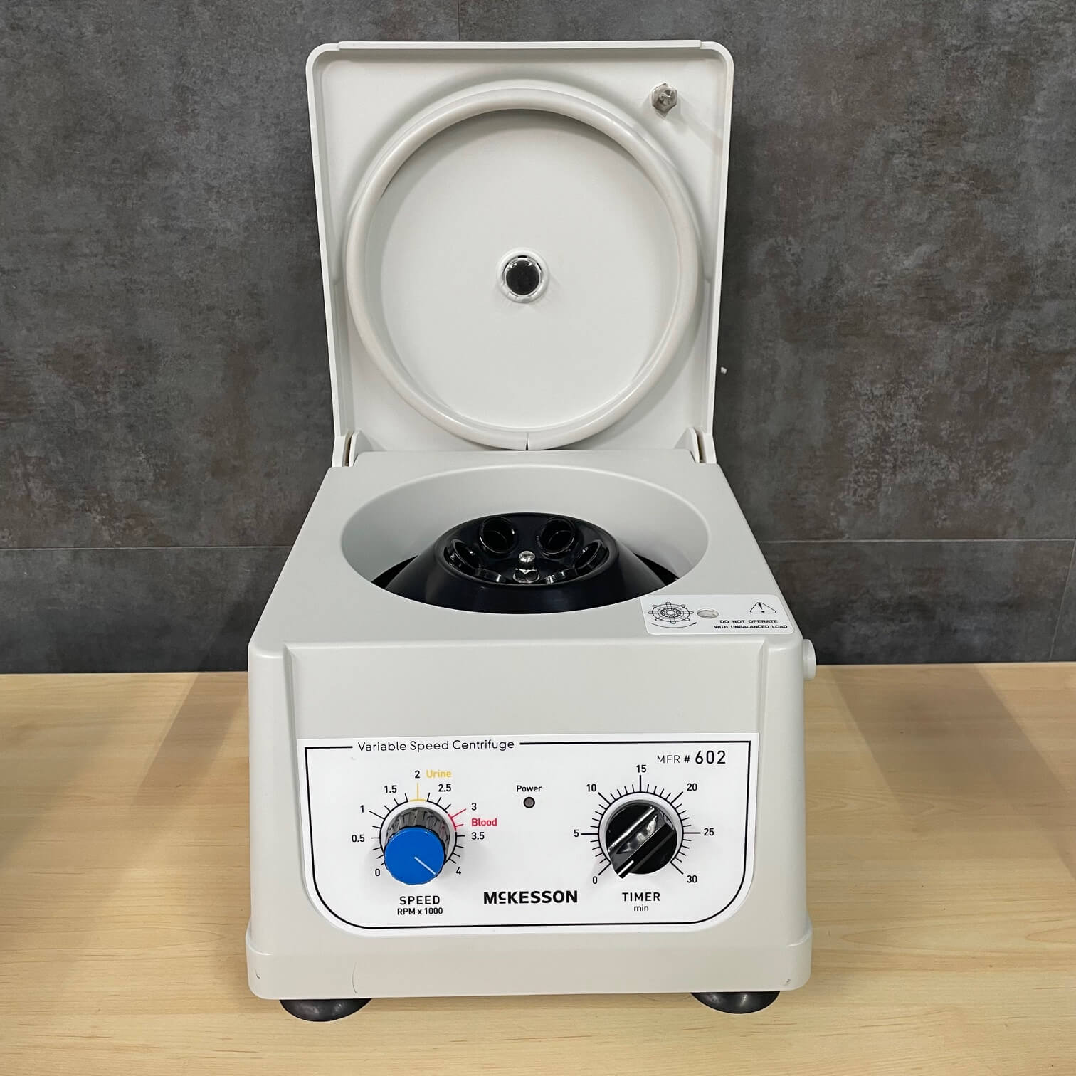 Unico Power Spin Centrifuge with the lid open - Angelus Medical