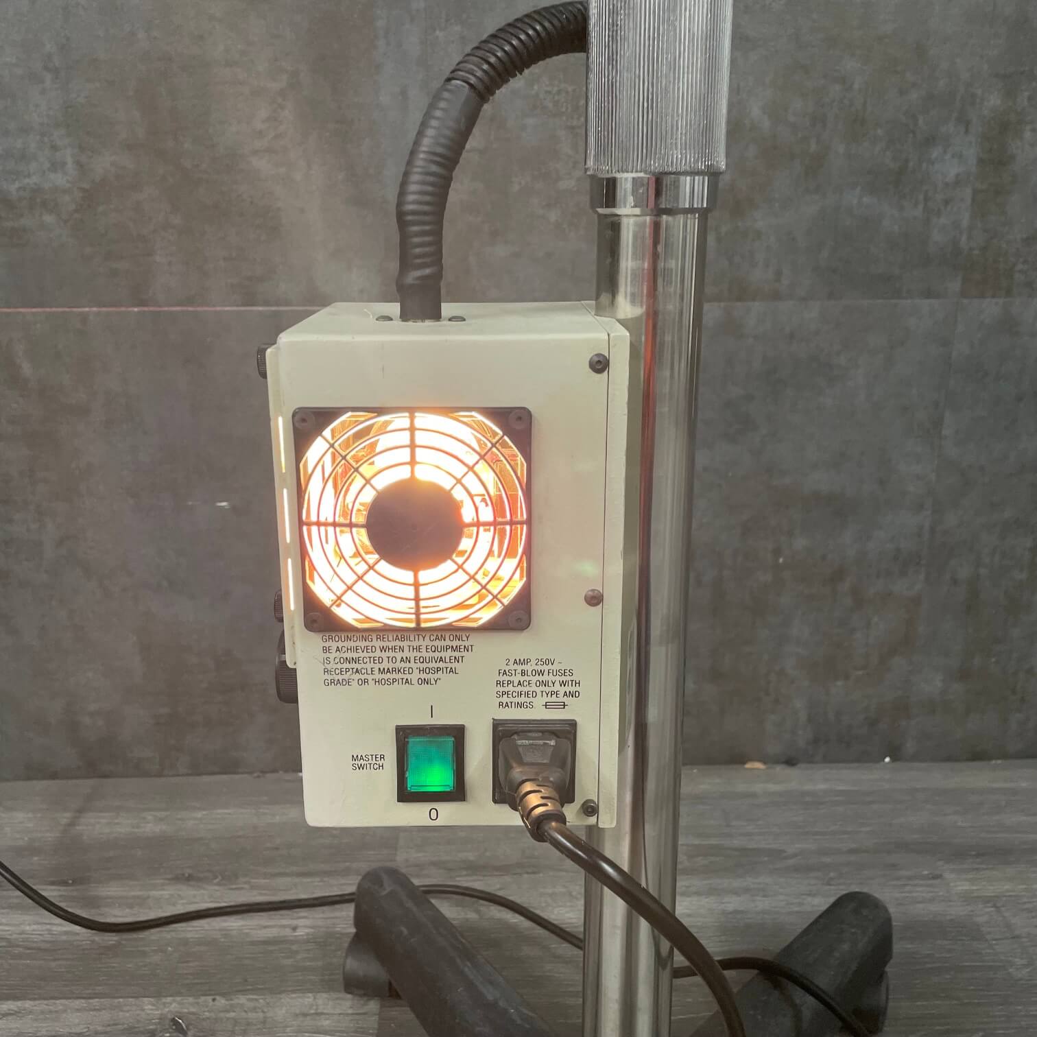 LED light source on Wallach colposcope for clear visualization