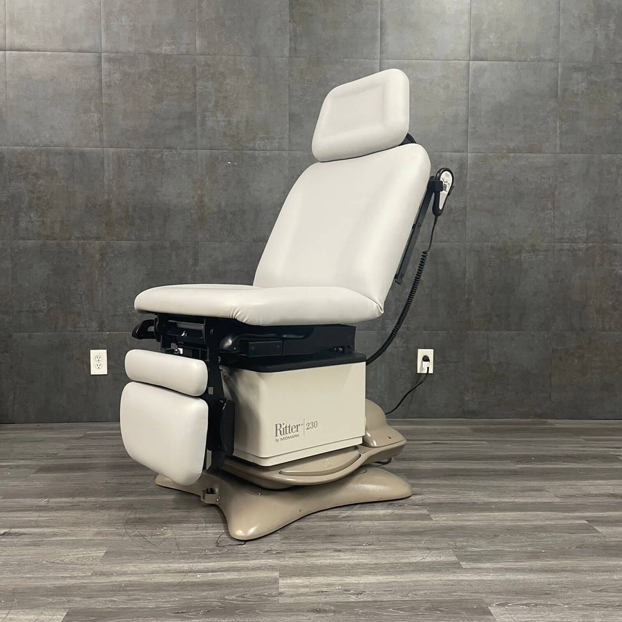 Refurbished professional Midmark Ritter 230 clinical procedure chair with rotational base for sale