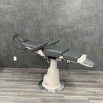 Side view of Reliance 710 exam chair with motorized recline and adjustable positioning - for sale near me