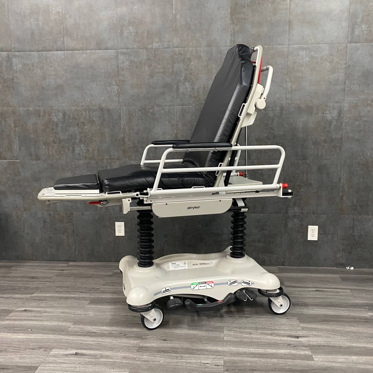 Side profile of Stryker 5050 stretcher chair showing hydraulic frame for sale near me