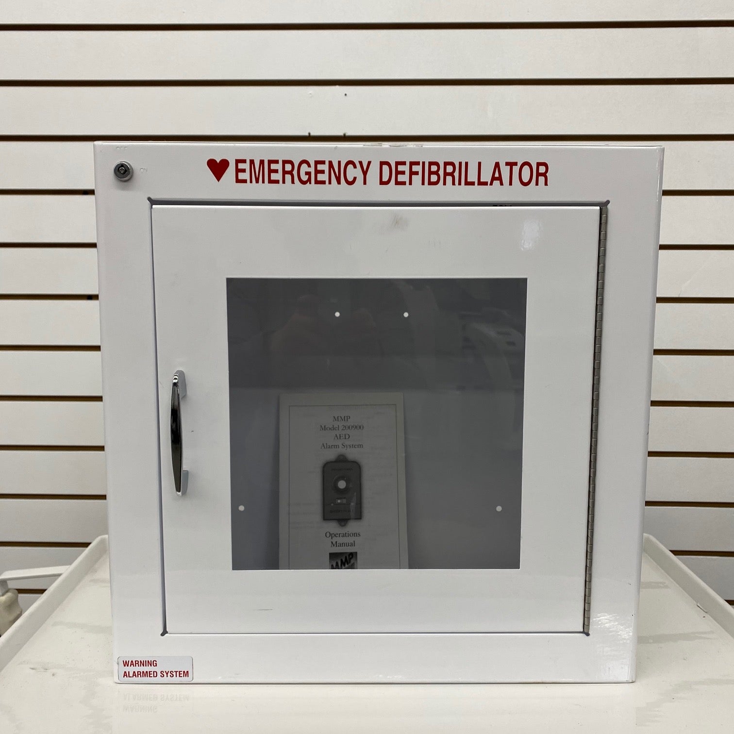 AED Wall Cabinet with Alarm (Used) - NMD -Angelus Medical
