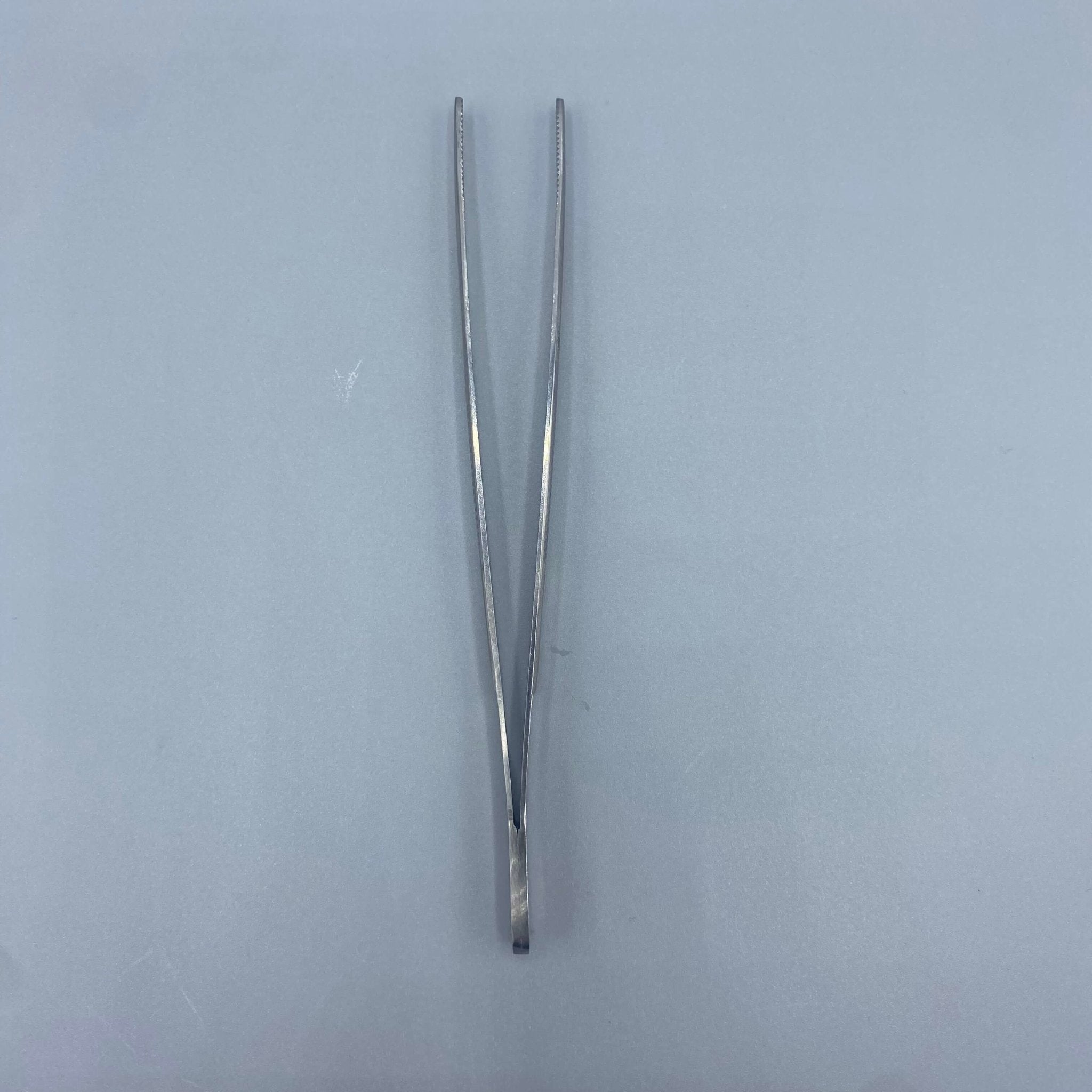 Crown Thumb dressing Forceps Serrated - – Angelus Medical and Optical